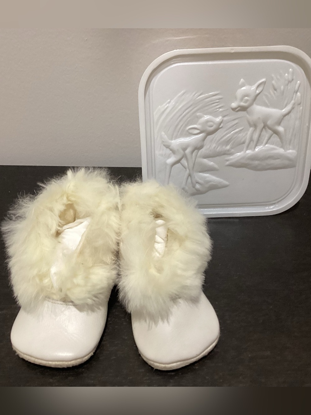 Vintage leather baby booties with real rabbit fur trim.  Very popular style in